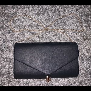 NWT ✨ Black clutch bag with gold accents